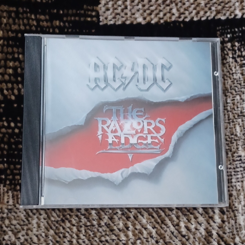 4/$60 AC/DC "The Razors Edge" - CD